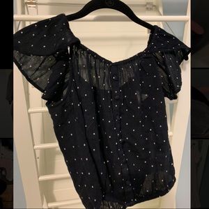 Black and white polka-dot off the shoulder top